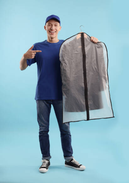 Delivering fresh dry cleaning in a garment bag for our dry cleaning and wash and fold laundry service in Jacksonville, Nocatee, St. Johns & beyond